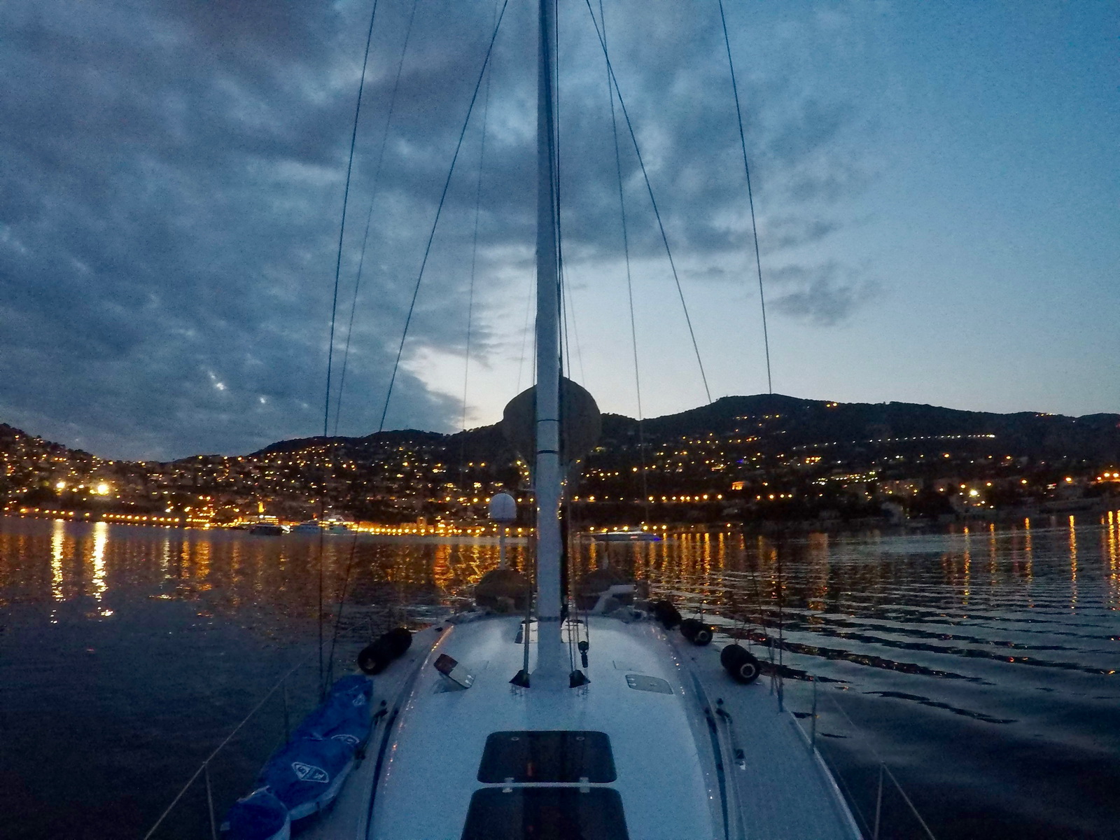 Evening view from the yacht towards the lights of the Riviera