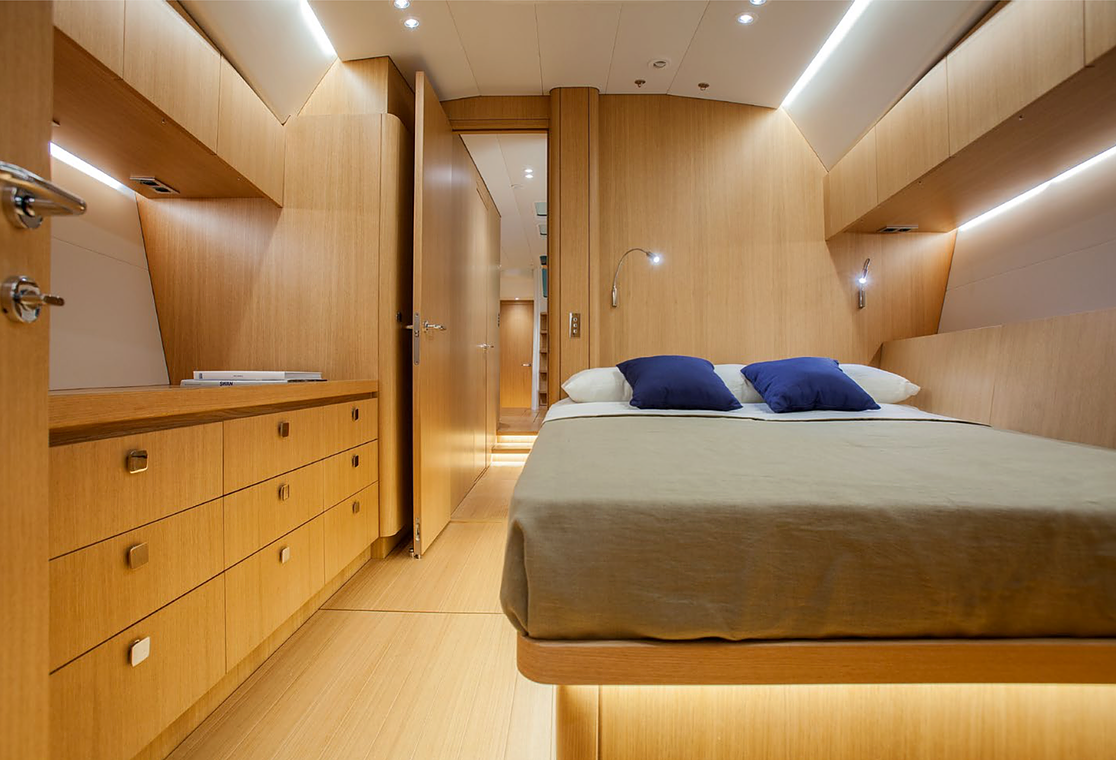 Warm wood double cabin aboard the Swan 60